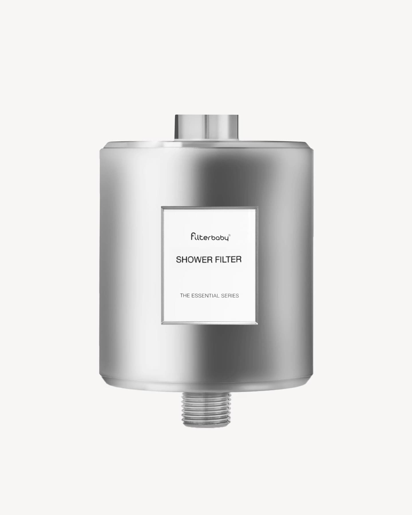 Filterbaby whole-home filter hardware on a clean studio field